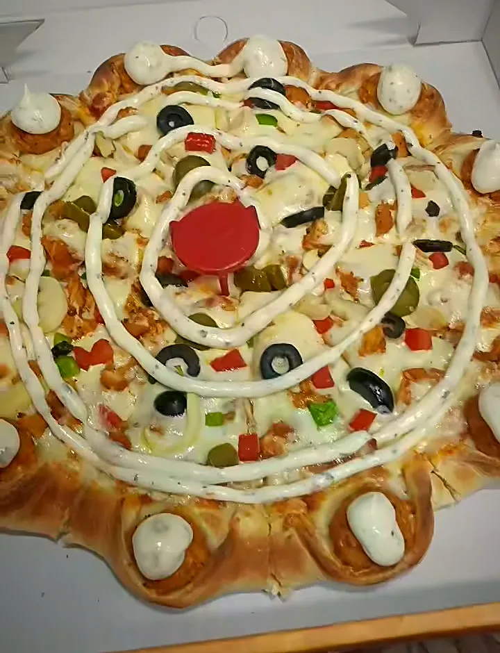 GFC's Crown Crust pizza, fresh out of the oven, in its box